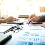 business-man-financial-inspector-secretary-making-report-calculating-checking-balance-internal-revenue-service-inspector-checking-document-audit-concept-1024x683
