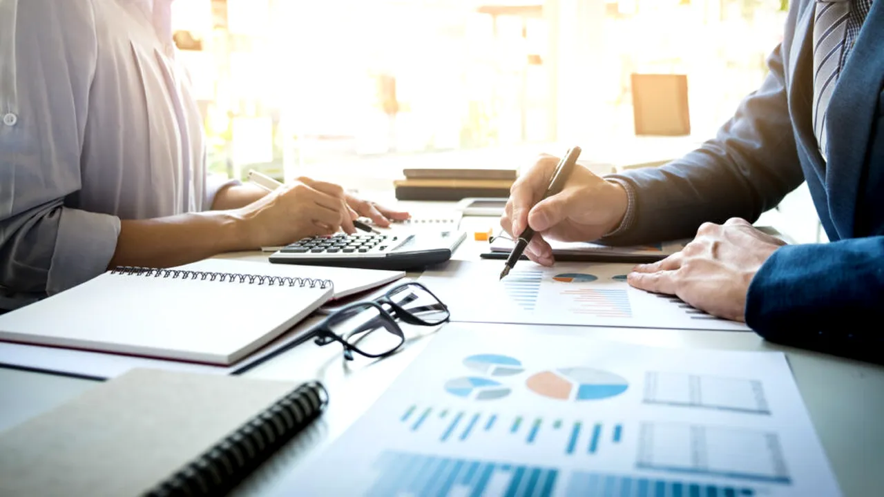 business-man-financial-inspector-secretary-making-report-calculating-checking-balance-internal-revenue-service-inspector-checking-document-audit-concept-1024x683